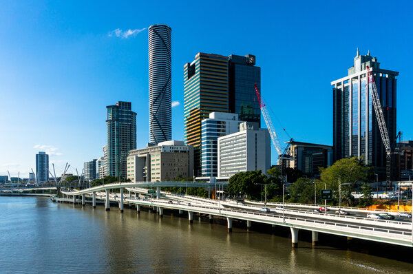 Cityscape with skyscrapers and modern bridge road. Space for text. Modern city on the river. Brisbane, Australia