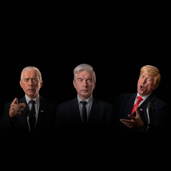 American presidential elections 2020 on dark and black background, three mature gray-haired men, character, actor, democrat, alter ego arguing and gesturing in debate