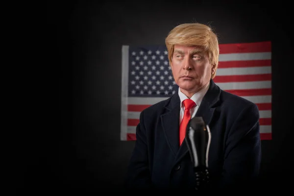 American Presidential Election 2020 on dark background with American Stars and Stripes, triumphant mature man, character, actor, Democrat, Republican.
