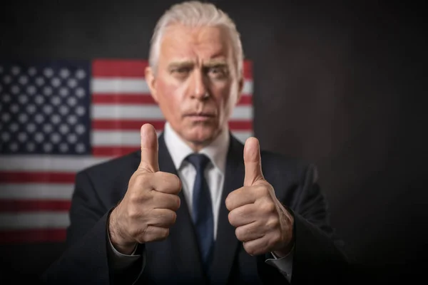 American presidential elections 2020 on a dark background with the American flag, a mature gray-haired man, character, actor, republican who emotionally gestures and shows thumbs up in debates.
