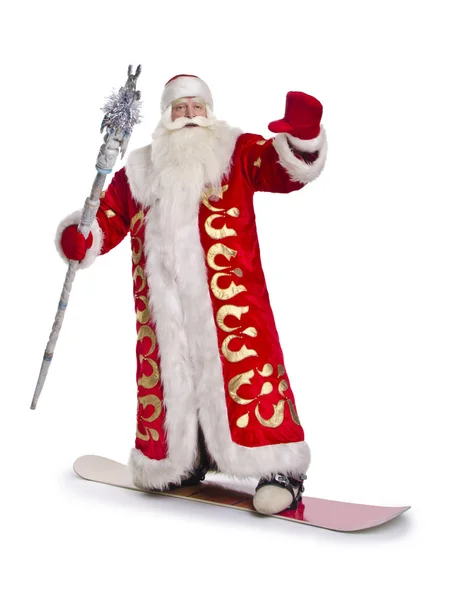 Le Père Noël est debout sur son snowboard — Photo