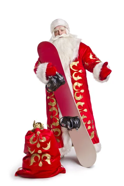 Papá Noel mantiene su tabla de snowboard — Foto de Stock