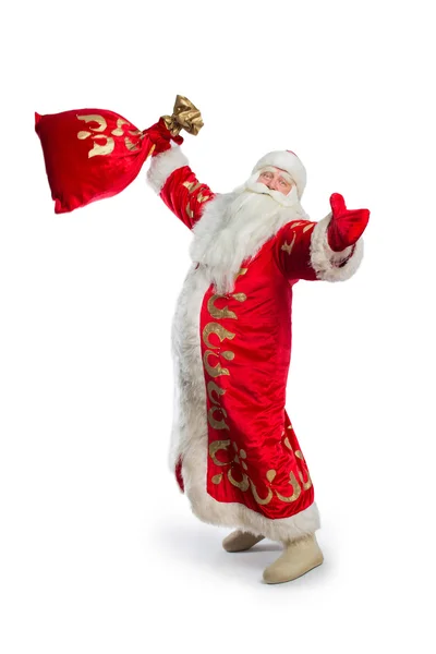 Kerstman is met zak van giften permanent — Stockfoto