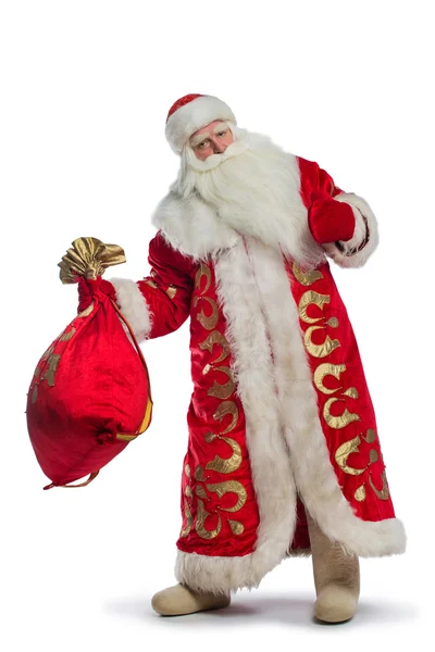 Père Noël est debout avec un sac de cadeaux — Photo
