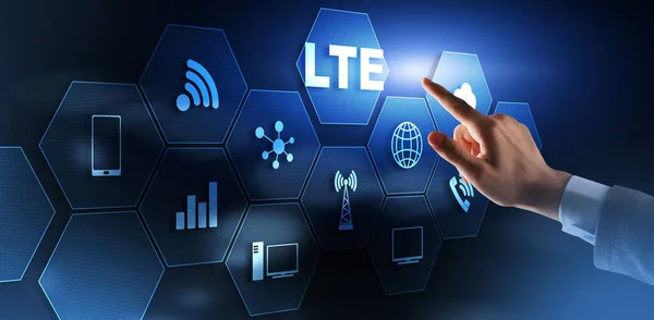 Technology internet business. Young business man presses with a finger LTE. — Stock Photo, Image