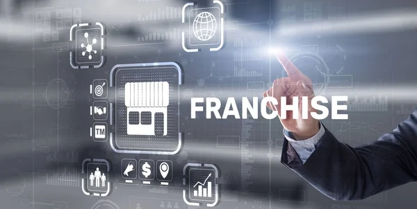 Businessman hand touching inscription Franchise marketing system — Stock Photo, Image