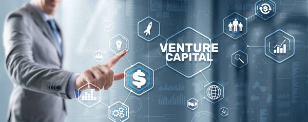 Venture capital. Investor capital. Businessman pressing virtual screen inscription