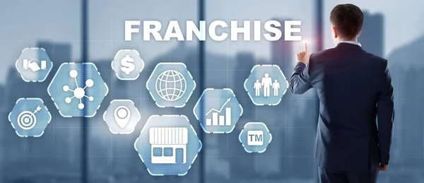 Business concept 2021 Franchise. Businessman is selecting Franchising — Stock Photo, Image