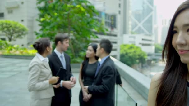 Multi ethnic business people outside office — Stock Video