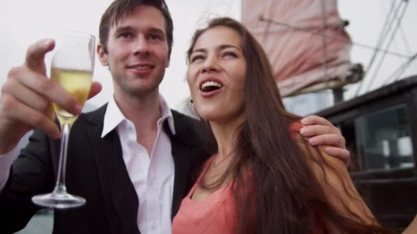 Caucasian couple enjoying champagne on the boat — Stock Video