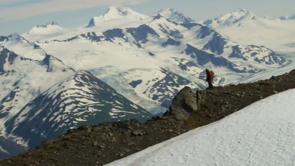 Mountain peak climber walking at Chugach Mountains — Stock Video