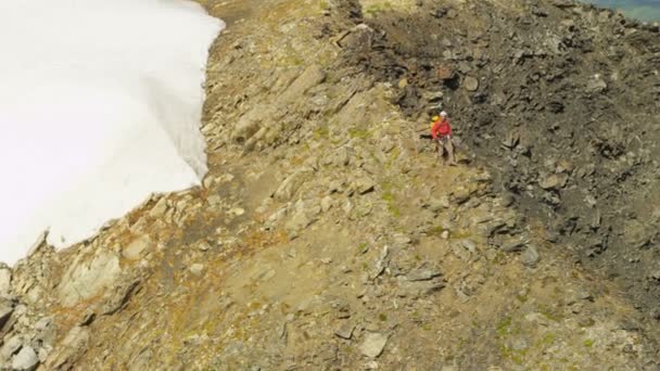 Mountain peak climber walking at Chugach Mountains — Stock Video