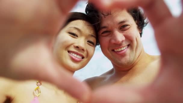 Couple having fun on beach — Stock Video