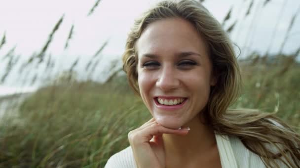 Girl enjoying time alone on beach — Stock Video