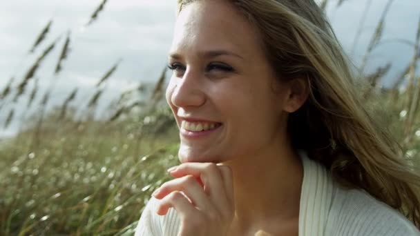 Girl enjoying time alone on beach — Stock Video