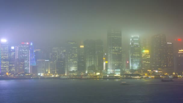 Horizonte de Hong Kong com arranha-céus iluminados — Vídeo de Stock