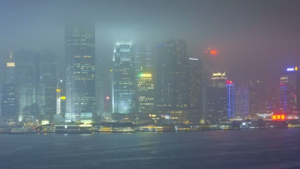 Hong Kong skyline with illuminated skyscrapers — Stock Video