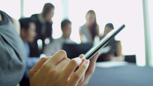 Businesswoman using wireless tablet in boardroom — Stock Video