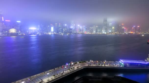 Hong Kong skyline with illuminated skyscrapers — Stock Video