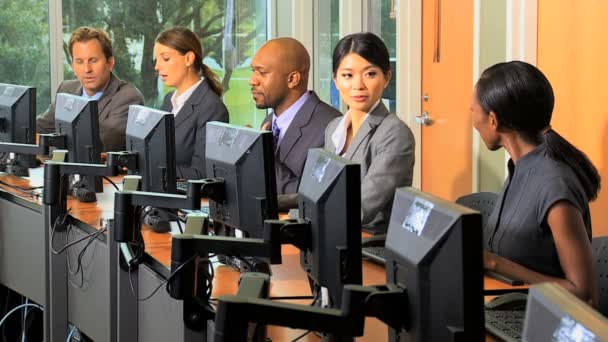 Multi ethnic business people working on compuers — Stock Video