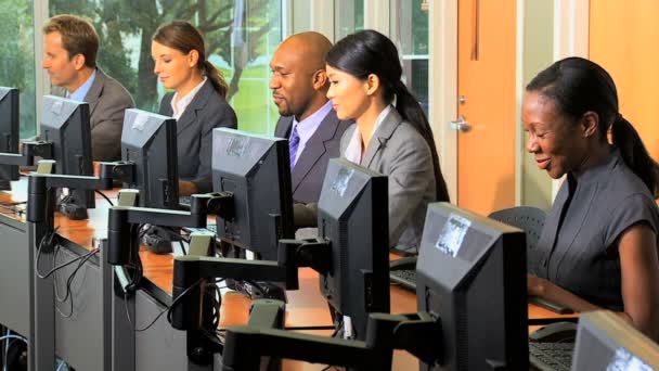 Multi ethnic business people working on compuers — Stock Video