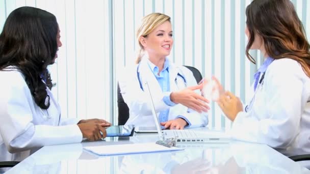 Female medical consultants having meeting in boardroom — Stock Video