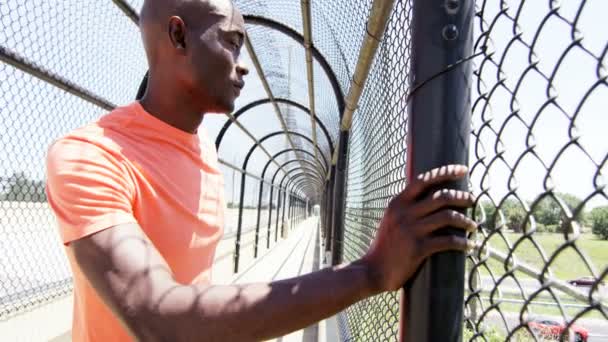 African American jogger warming up before training — Stock Video