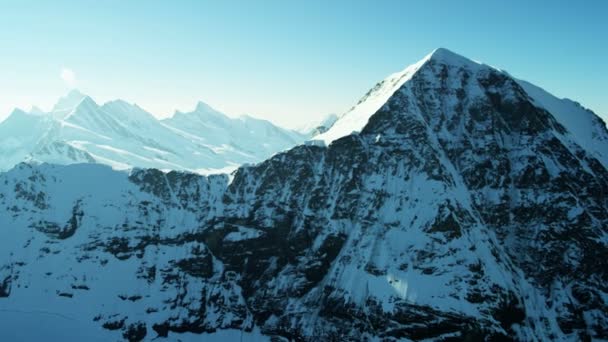 Snow capped mountain peaks in Grindelwald — Stock Video