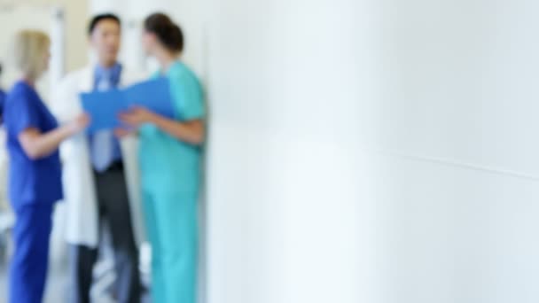 Female nurse working on tablet in hospital — Stock Video