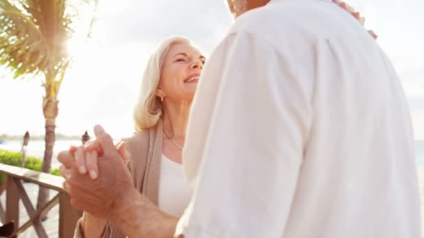 Caucasian senior couple dancing at sunset — Stock Video