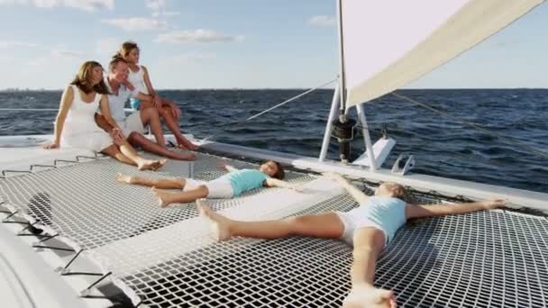 Family with children sailing on luxury yacht — Stock Video