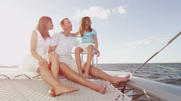 Family with daughter sailing on luxury yacht — Stock Video
