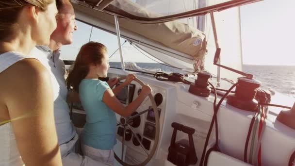 Family with daughter sailing on luxury yacht — Stock Video