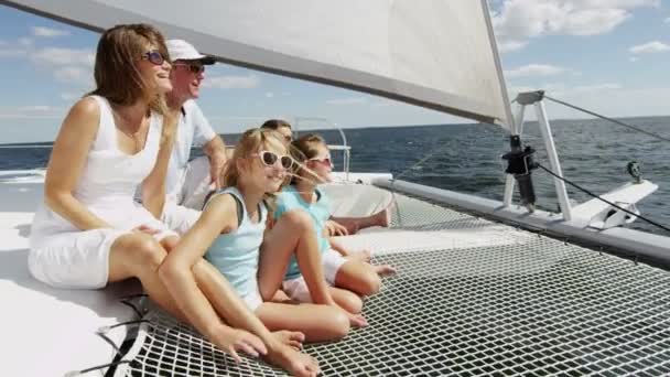 Family with children sailing on luxury yacht — Stock Video