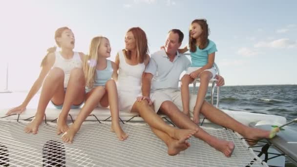 Family with children sailing on luxury yacht — Stock Video