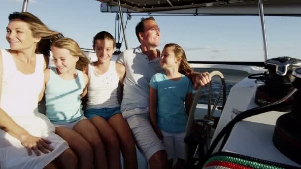 Family with children sailing on luxury yacht — Stock Video