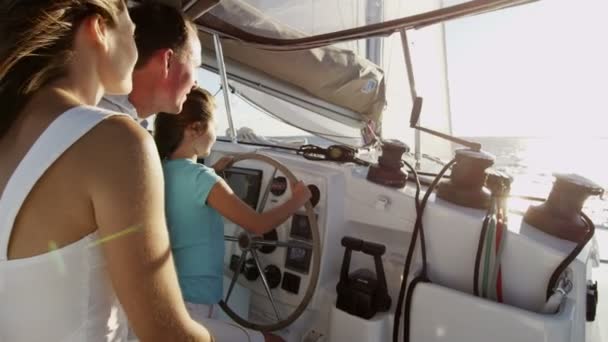 Family with daughter sailing on luxury yacht — Stock Video