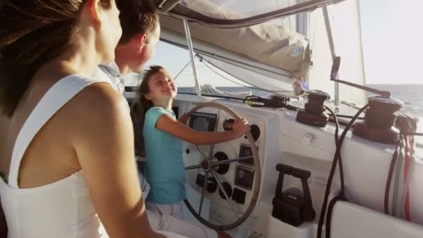 Family with daughter sailing on luxury yacht — Stock Video