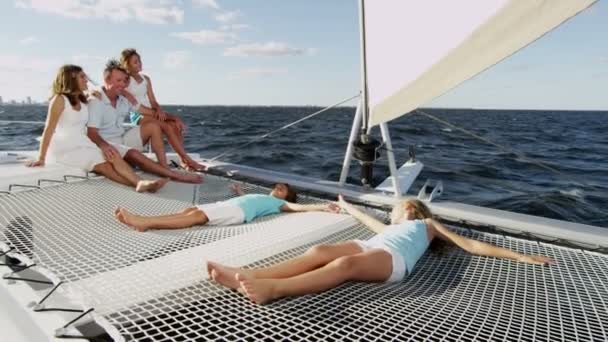 Family with children sailing on luxury yacht — Stock Video