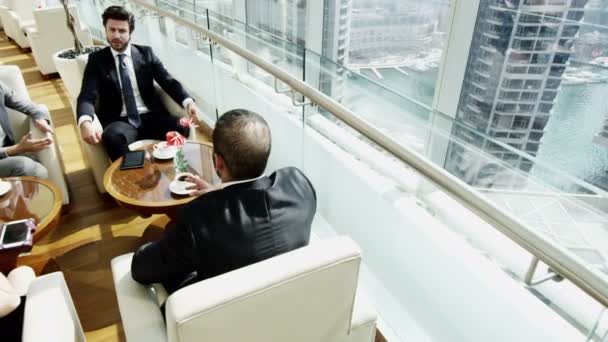 Business team having meeting in Dubai office building — ストック動画