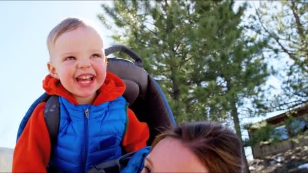 Mother with son enjoying walk in park — Stock Video