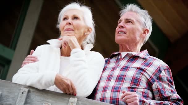 Senior couple on the porch of country house — Stock Video