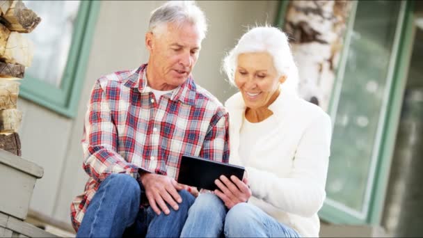 Senior couple using digital tablet — Stock Video