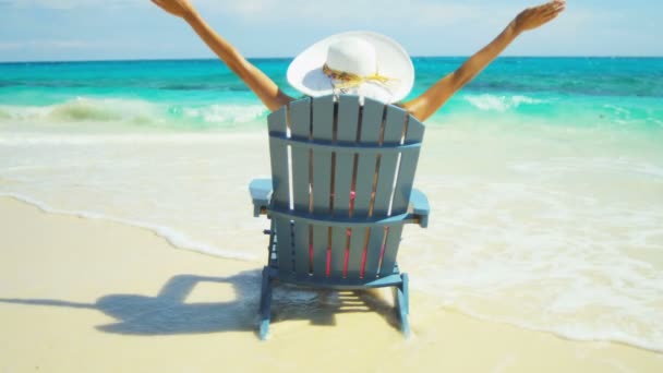 Female sunbathing on vacation beach — Stock Video