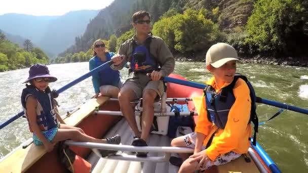 Parents and children rafting on River — Stock Video