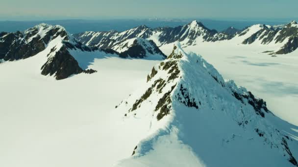 Frozen rock and snow covered mountains — Stock Video