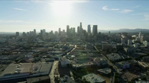 Aerial view across Skid Row to LA skyscrapers — Stockvideo