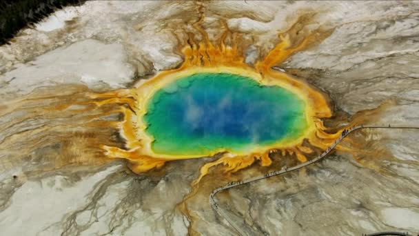 Aerial view vivid colored Yellowstone Basin mineral waters — Stock Video