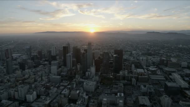 Aerial view downtown Los Angeles cityscape at sunset — Stockvideo