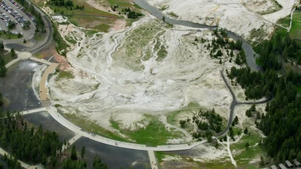 Aerial view Old faithful visitor center Yellowstone Wyoming — стокове відео